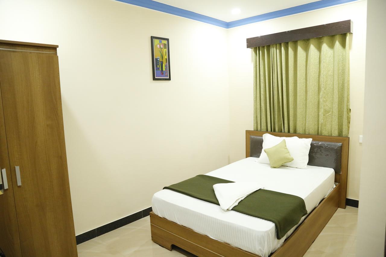 Hotel New Amirtham Inn Palani Exterior foto